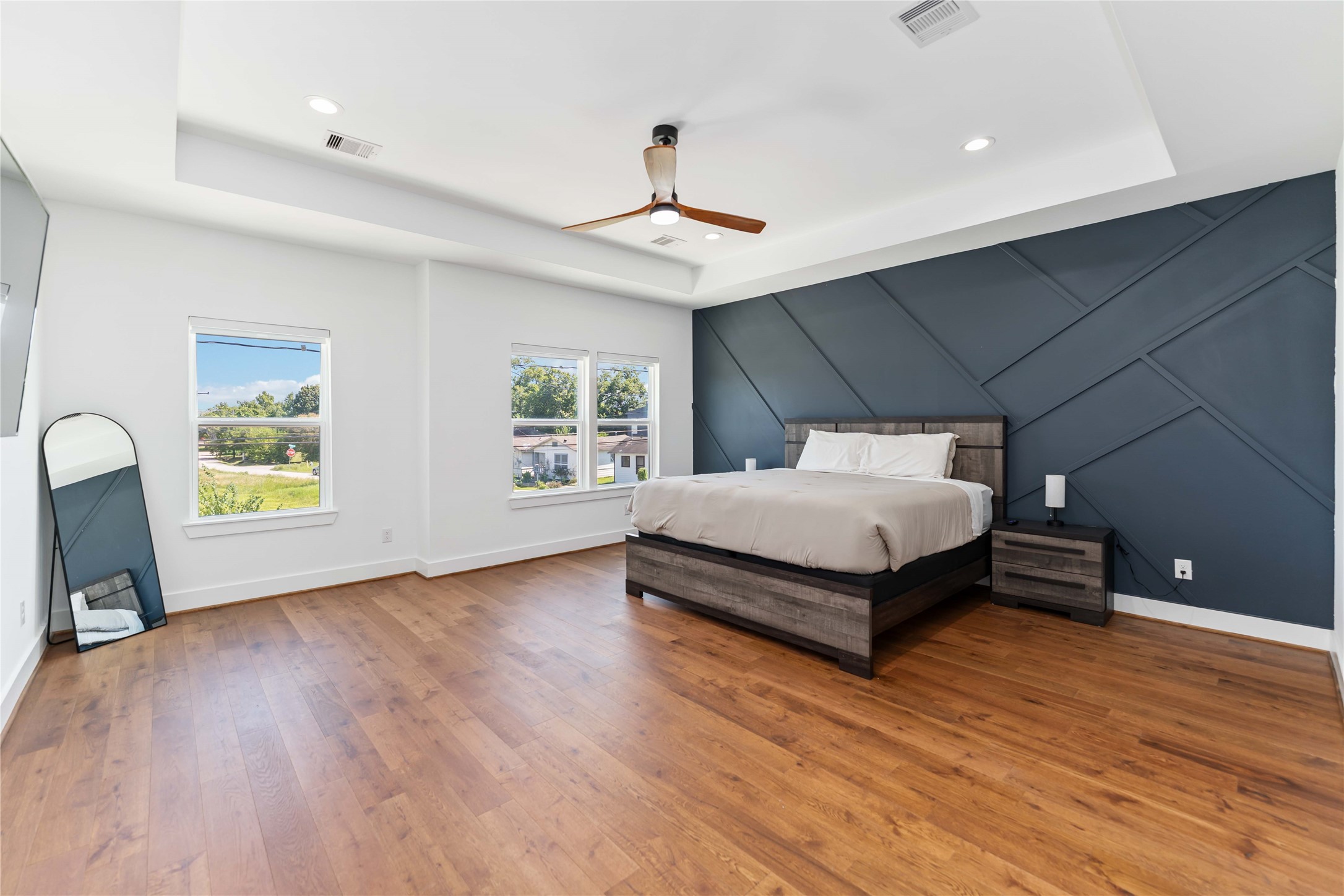 3040 Webster Street Houston, TX 77004 - Photo 7 of 18 a bedroom with a bed and a window