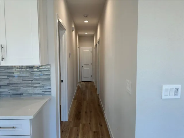 a view of hallway with stairs