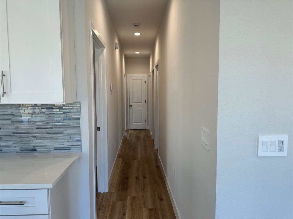 1115 Neches Street Lockhart, TX 78644 - Photo 12 of 22 a view of hallway with stairs