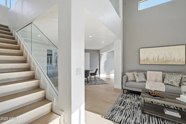 a view of a livingroom with furniture and dining table