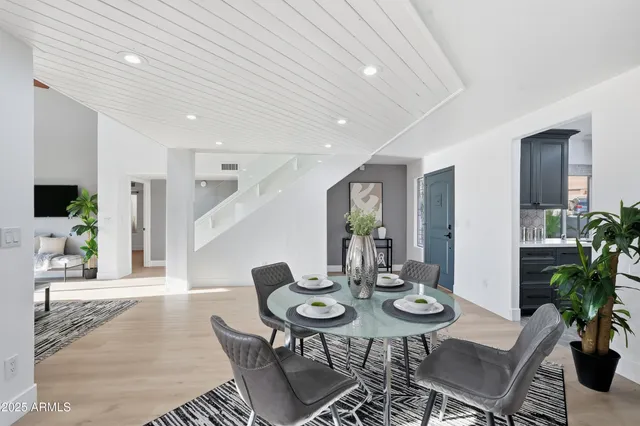 a kitchen with stainless steel appliances granite countertop a sink and cabinets