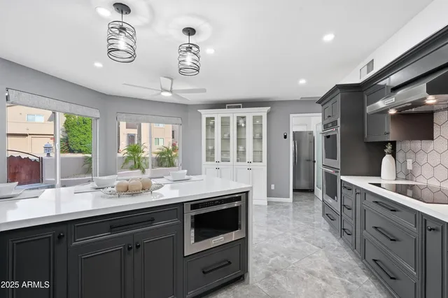 a kitchen with a sink and a cabinets