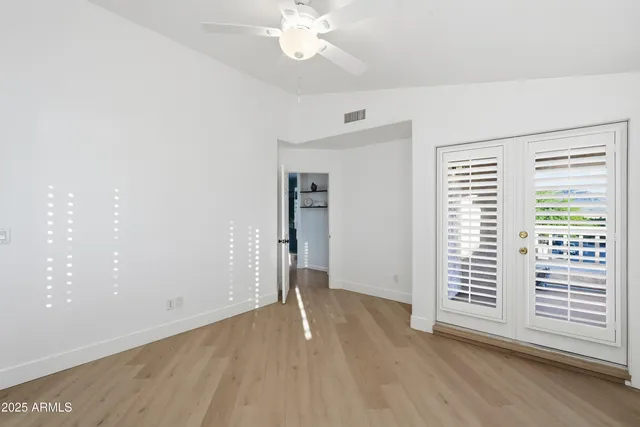 a bathroom with a bathtub and window