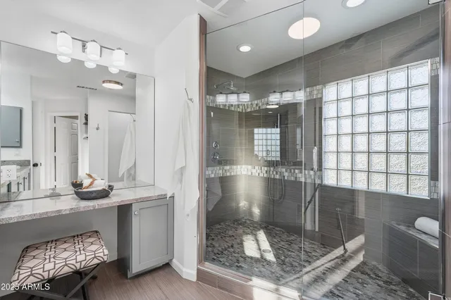 a view of balcony with wooden floor and fence
