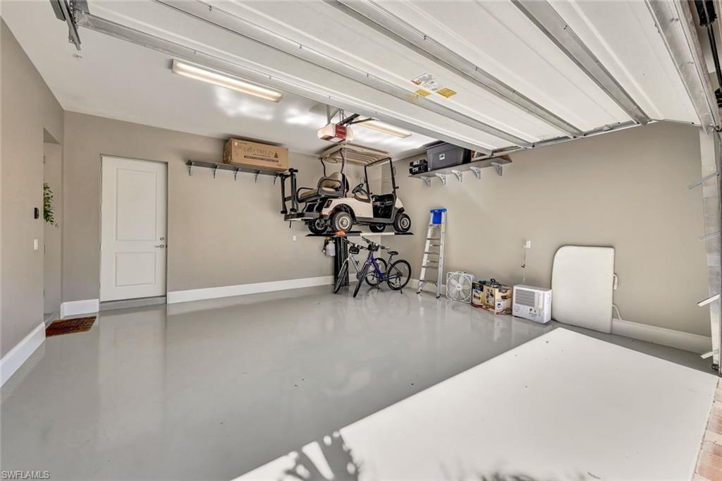 16340 Corsica Way, Unit 101 Naples, FL 34110 - Photo 37 of 48 Golf Cart Lift Included