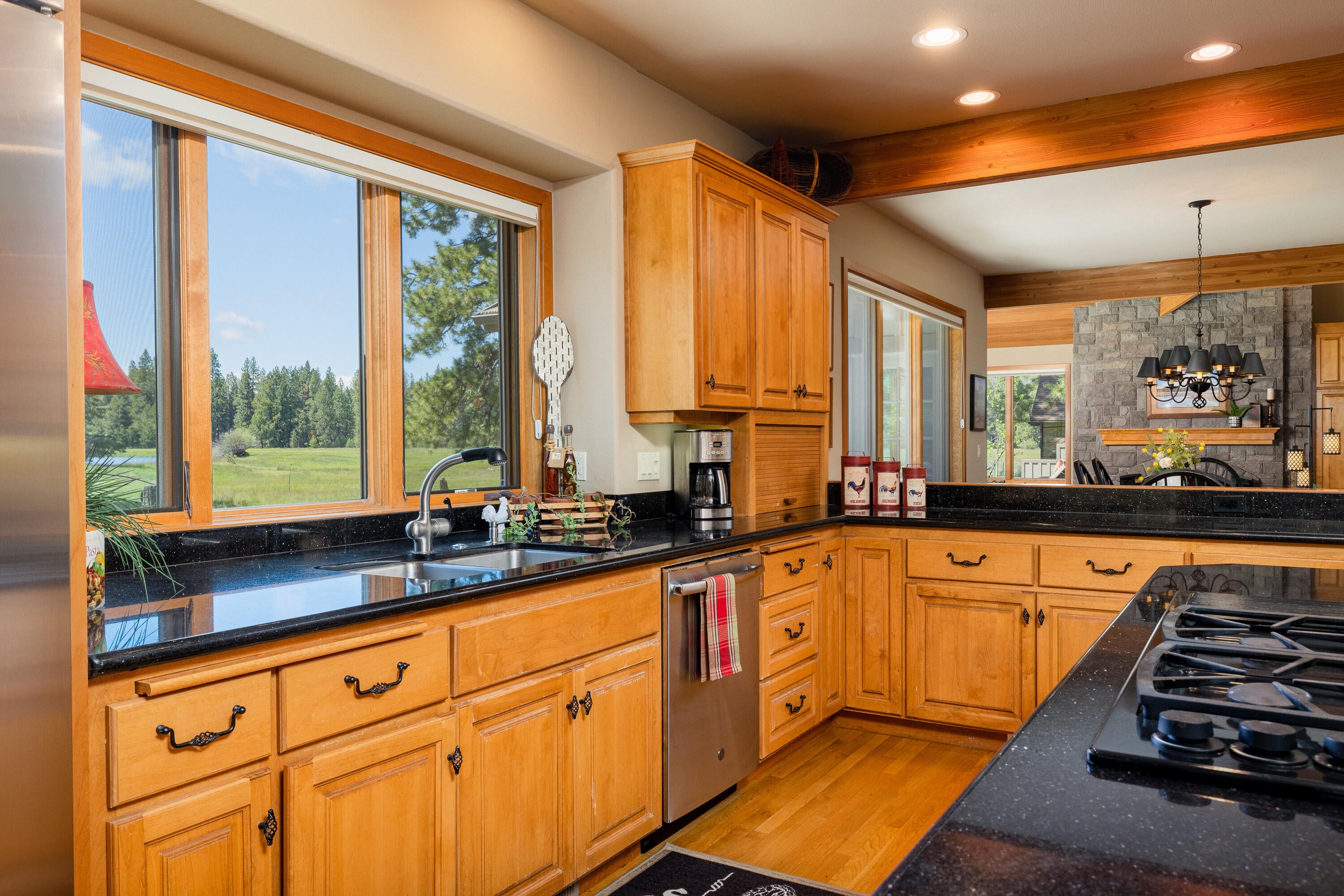 70331 Willow Herb, Unit GM205 Black Butte Ranch, OR 97759 - Photo 35 of 75 The kitchen has great views of the meadow and lake