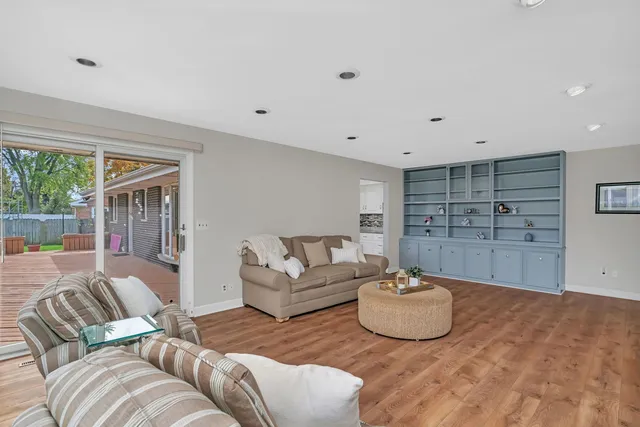 a living room with furniture and a table