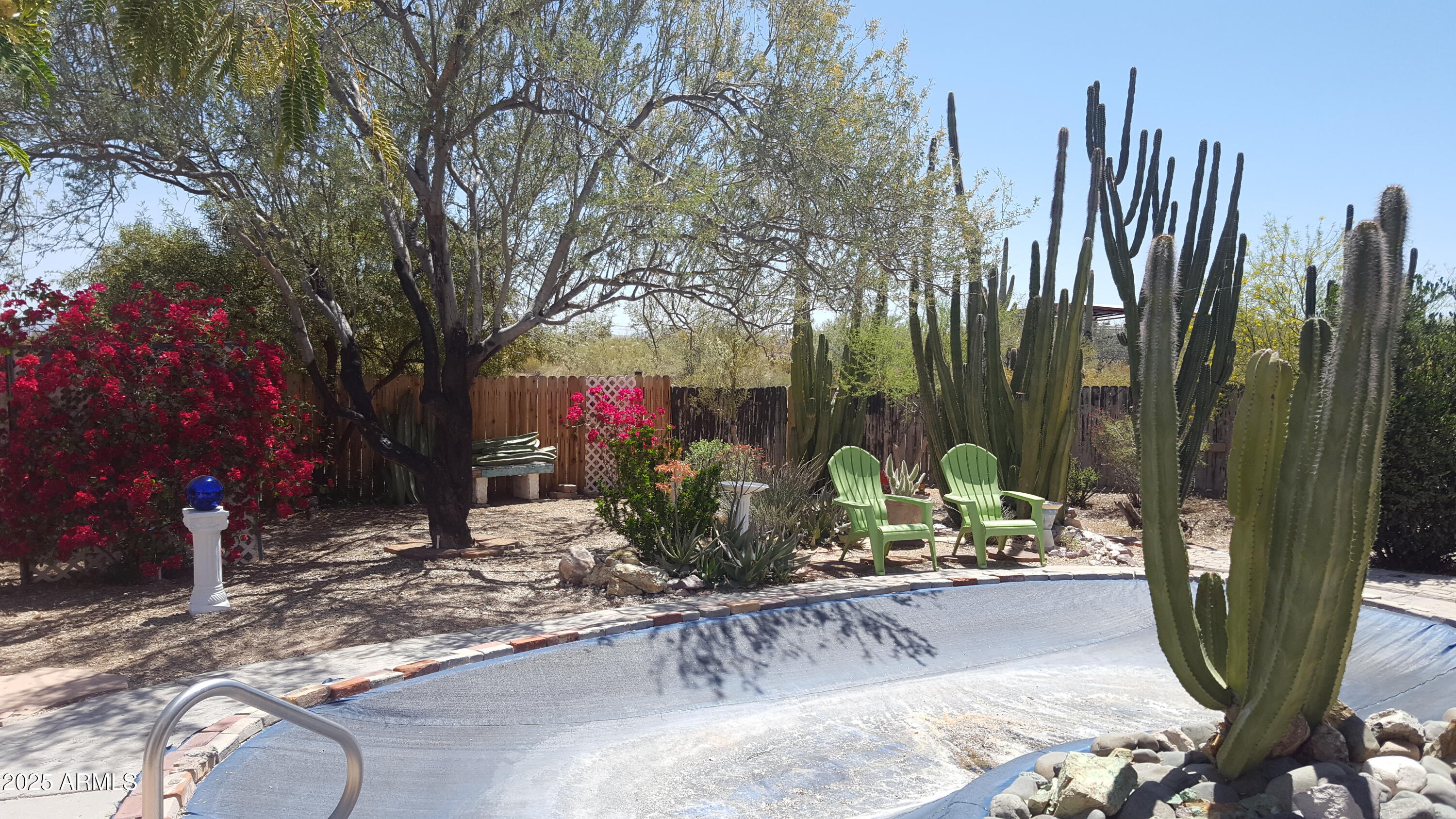 2860 North Elliott Road Ajo, AZ 85321 - Photo 7 of 35 a view of a backyard with sitting area