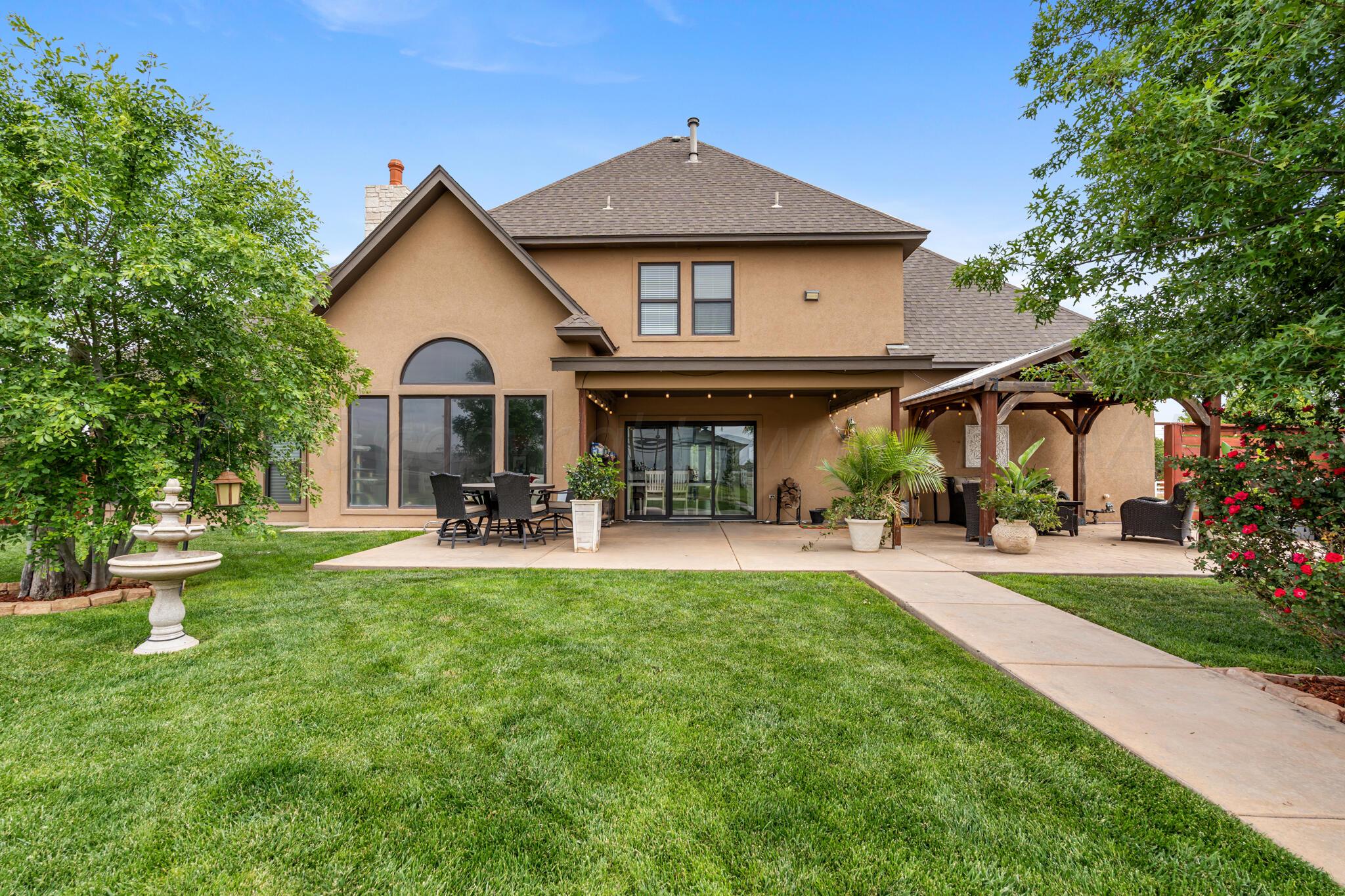 8901 Red Wing Road Amarillo, TX 79119 - Photo 66 of 66 a view of a house with a yard and sitting area