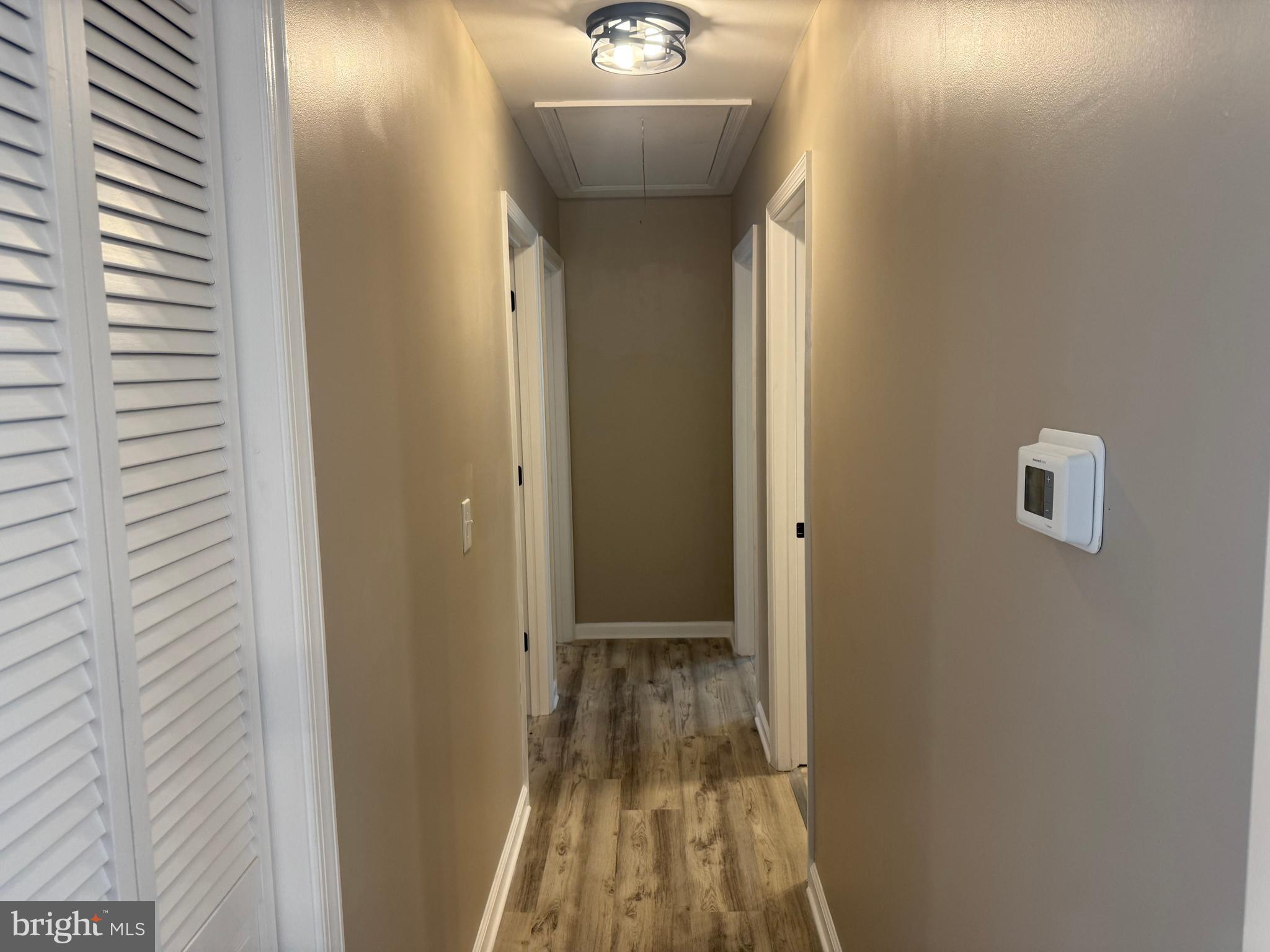 32201 Johnson Road Salisbury, MD 21804 - Photo 11 of 50 a view of a bathroom with a sink and wooden floor