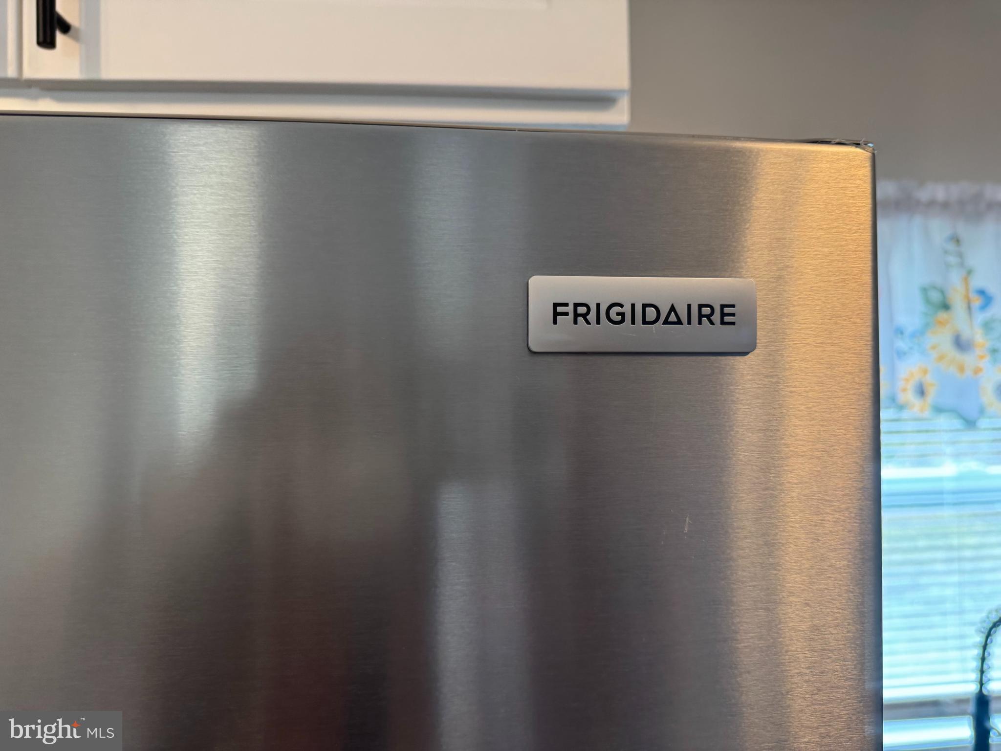 32201 Johnson Road Salisbury, MD 21804 - Photo 12 of 50 a close view of a refrigerator in kitchen