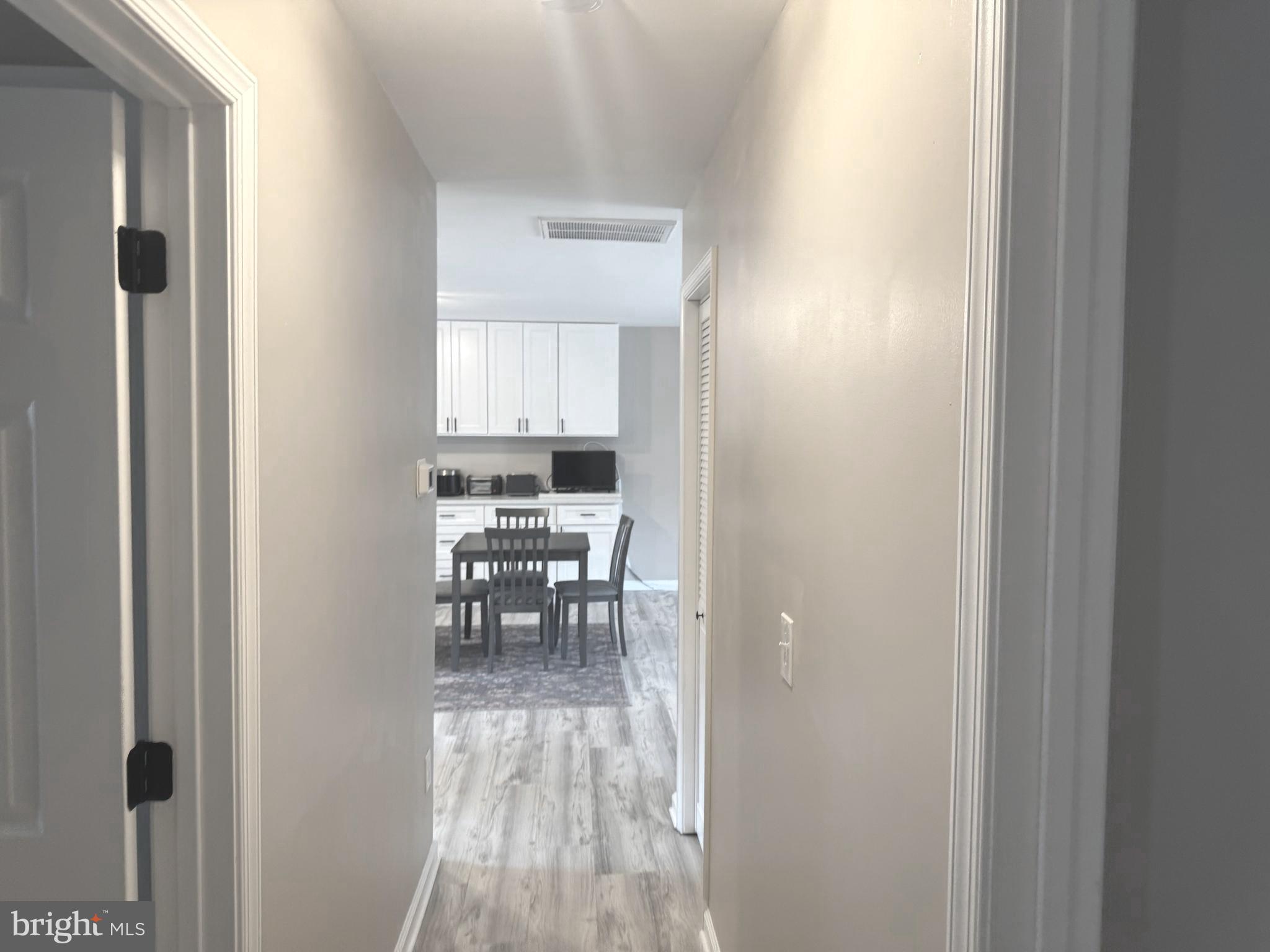 32201 Johnson Road Salisbury, MD 21804 - Photo 16 of 50 a view of a room that has a bed and a table in it