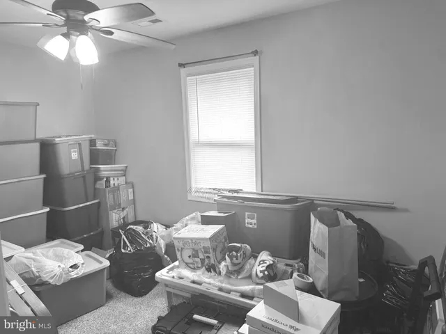 a living room with furniture and decor