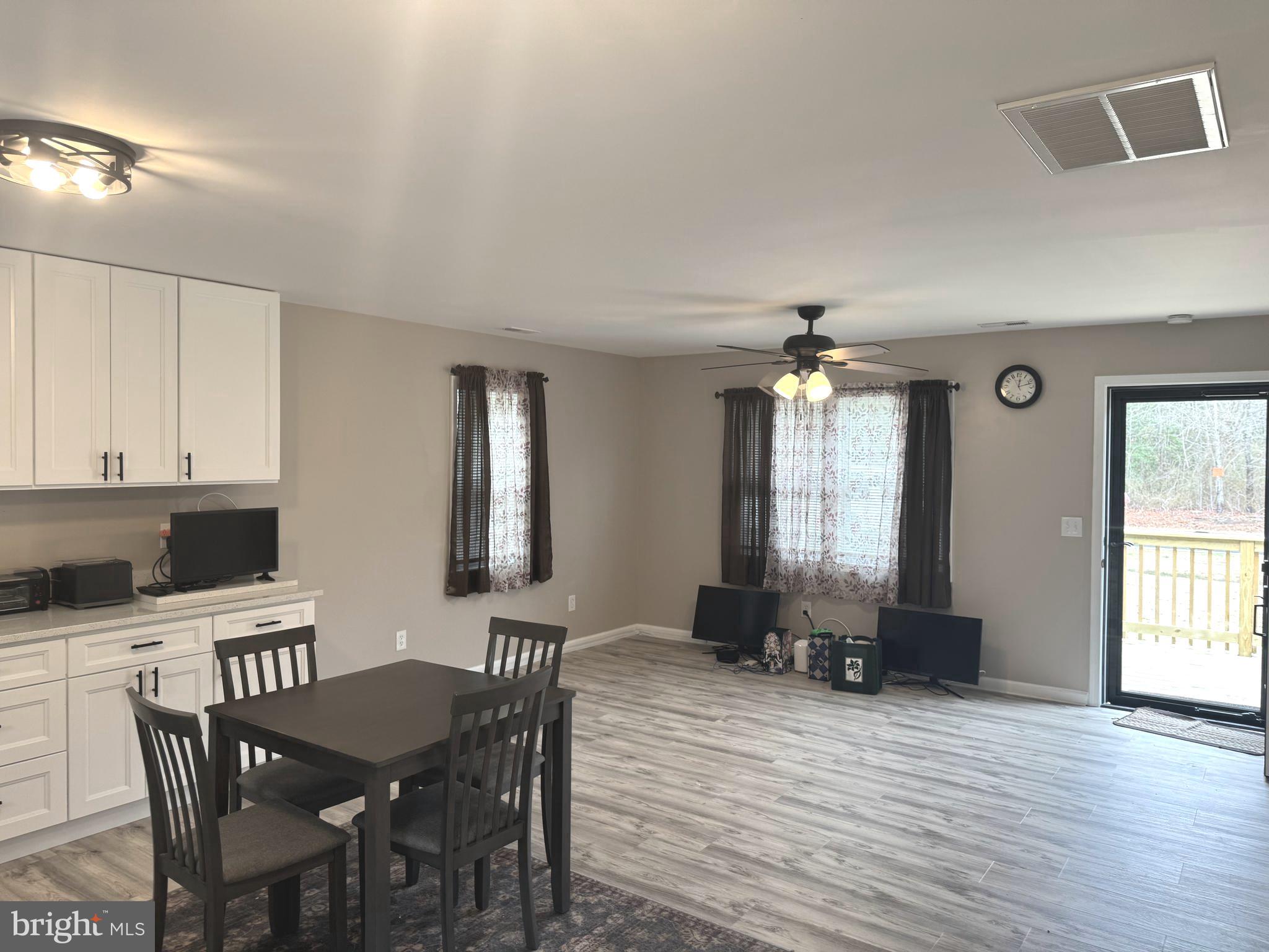 32201 Johnson Road Salisbury, MD 21804 - Photo 33 of 50 a view of a dining room with furniture and window