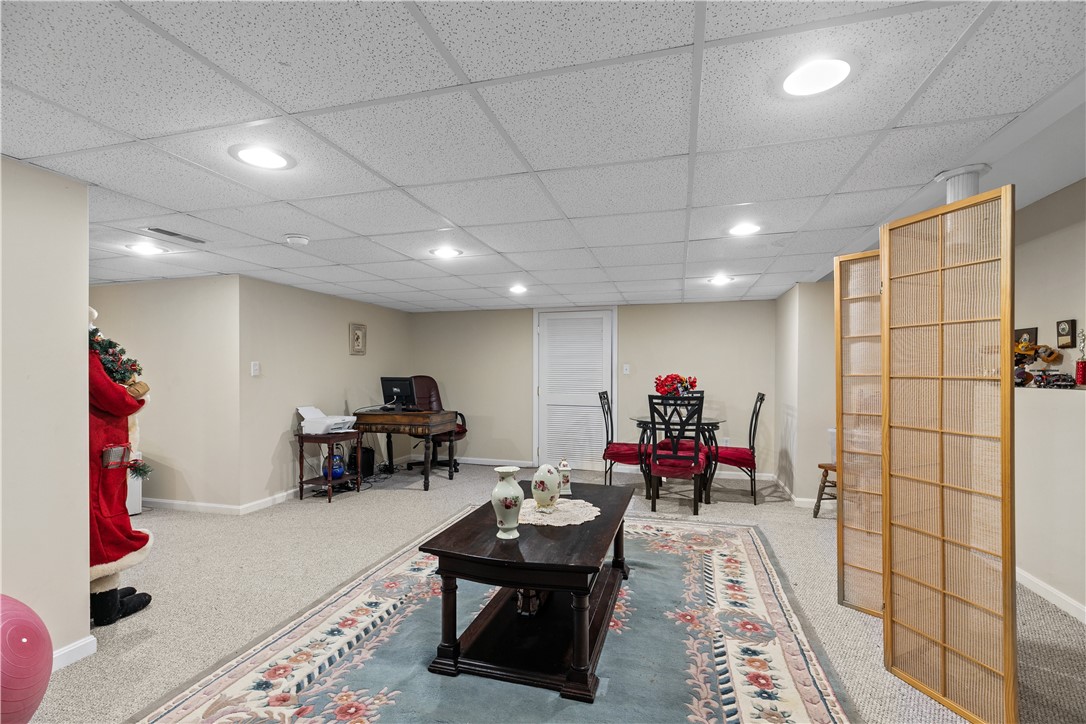 6 Rader Court Portsmouth, RI 02871 - Photo 40 of 47 Family Room towards Utility Room