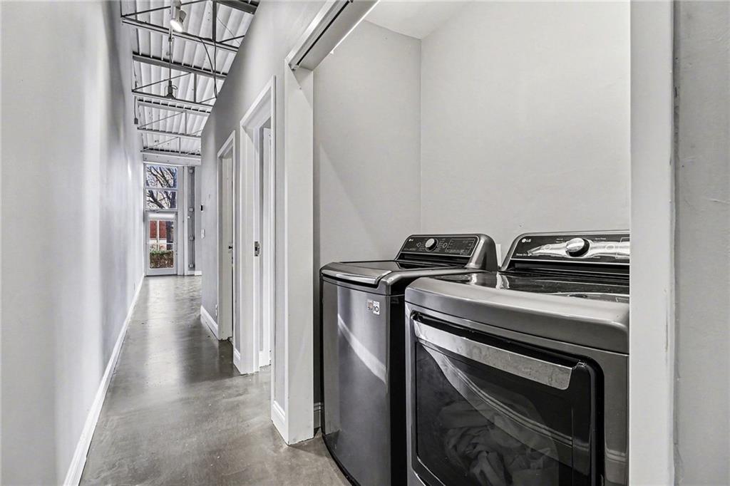 5200 Peachtree Road, Unit 2101 Atlanta, GA 30341 - Photo 13 of 37 a kitchen with a stove and a refrigerator