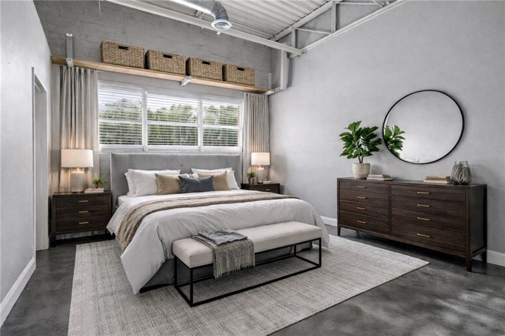 5200 Peachtree Road, Unit 2101 Atlanta, GA 30341 - Photo 14 of 37 a bedroom with a bed mirror and window