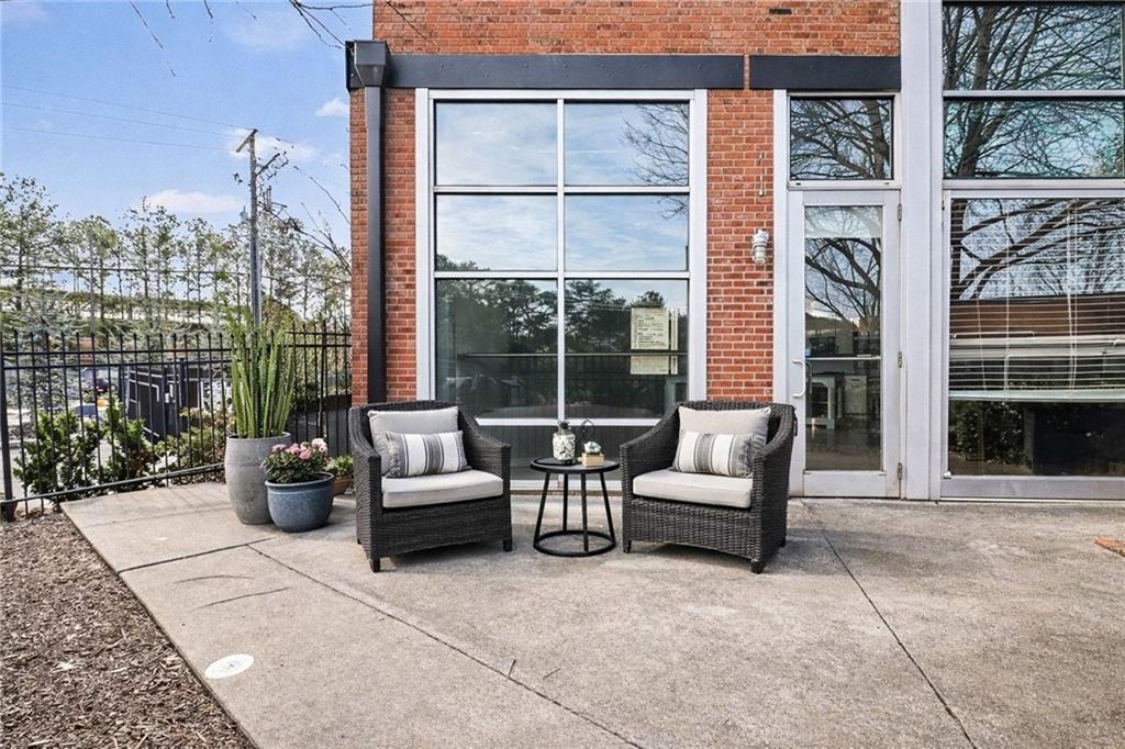 5200 Peachtree Road, Unit 2101 Atlanta, GA 30341 - Photo 25 of 37 a building outdoor space with seating space