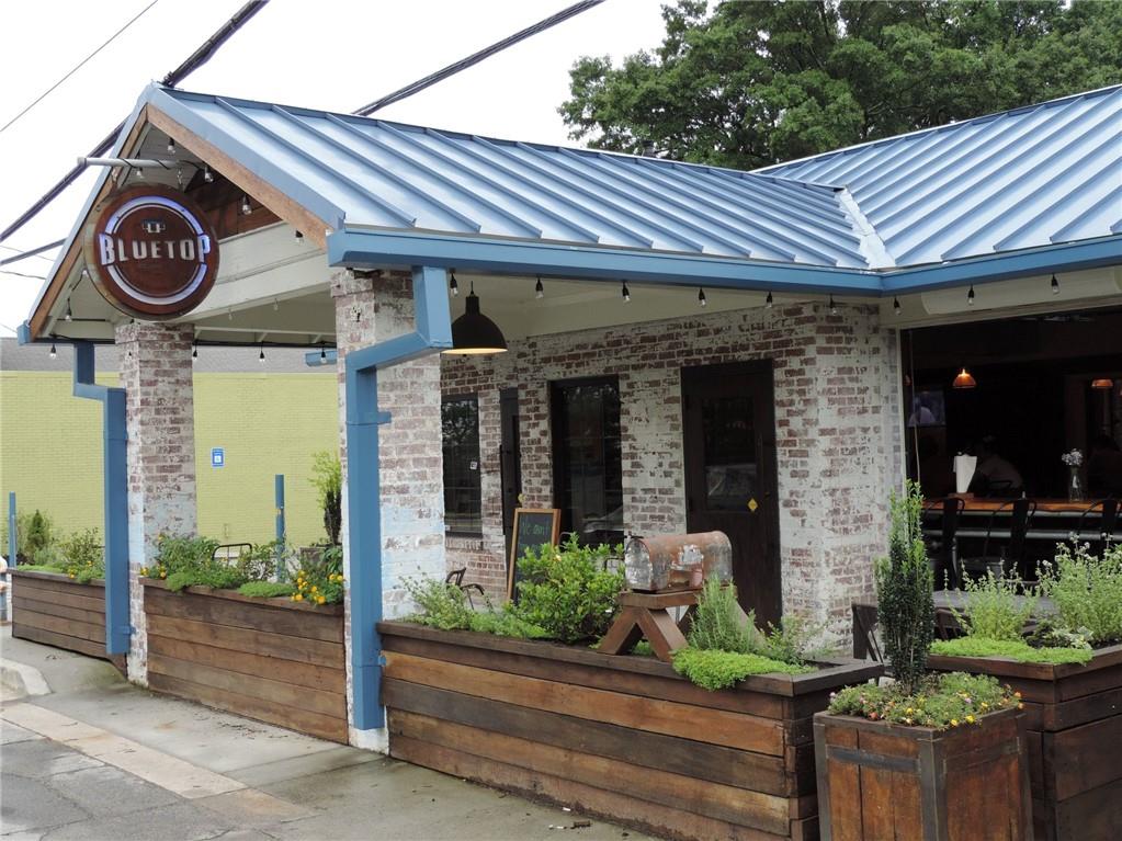 5200 Peachtree Road, Unit 2101 Atlanta, GA 30341 - Photo 32 of 37 a front view of a house with garden