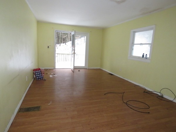 8 East Buckland Road Buckland, MA 01370 - Photo 4 of 10 a view of an empty room with a window
