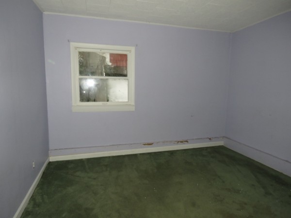 8 East Buckland Road Buckland, MA 01370 - Photo 6 of 10 an empty room with a window