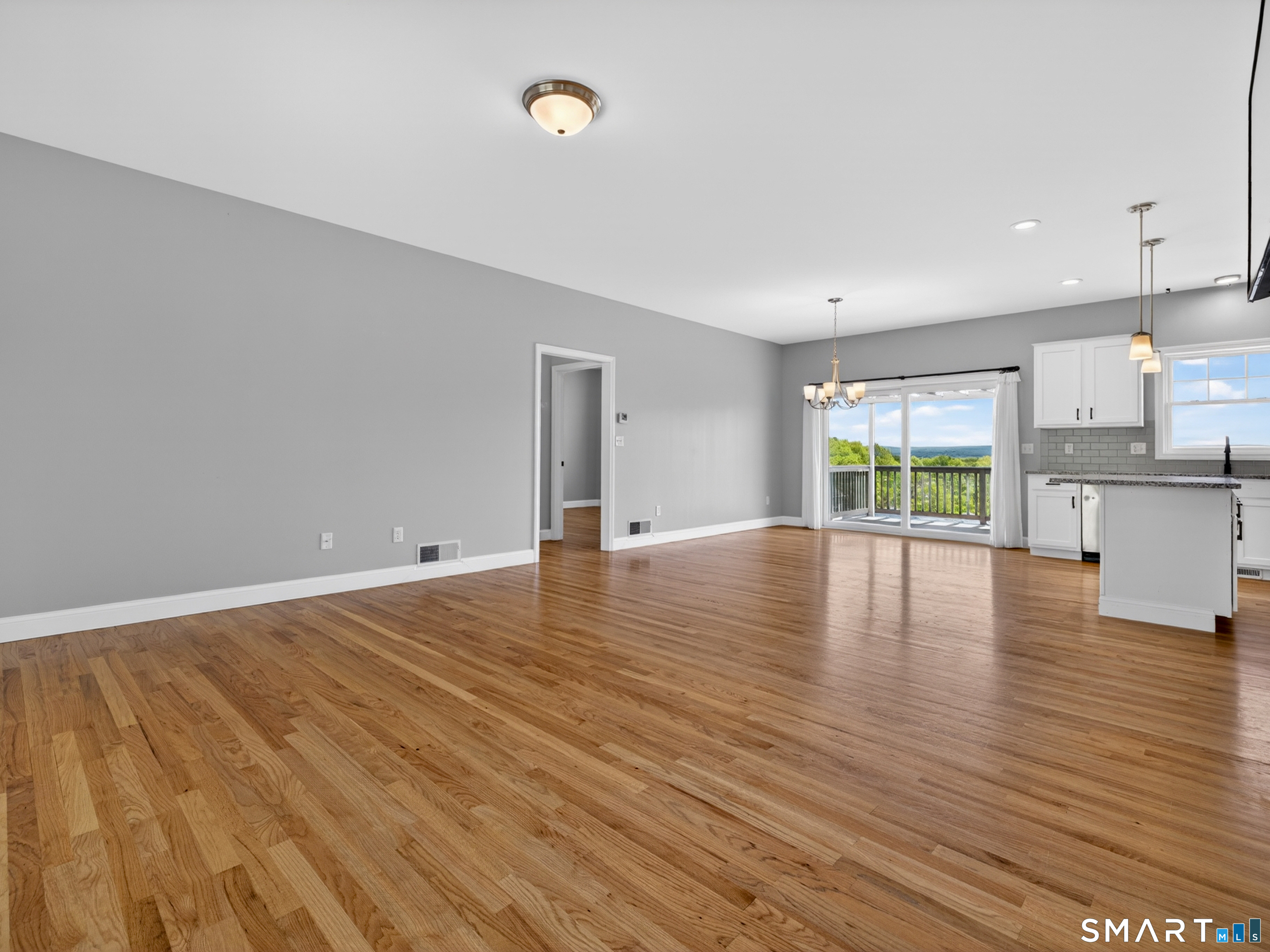 650 Ridgewood Road Middletown, CT 06457 - Photo 16 of 40 a view of empty room with wooden floor and window