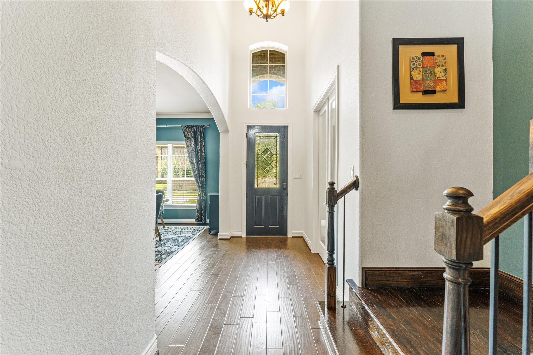 2506 Barclay Lake Lane Spring, TX 77388 - Photo 4 of 35 A grand welcome! Soaring two-story ceilings, rich hardwood floors, and elegant architectural details set the tone the moment you step inside.