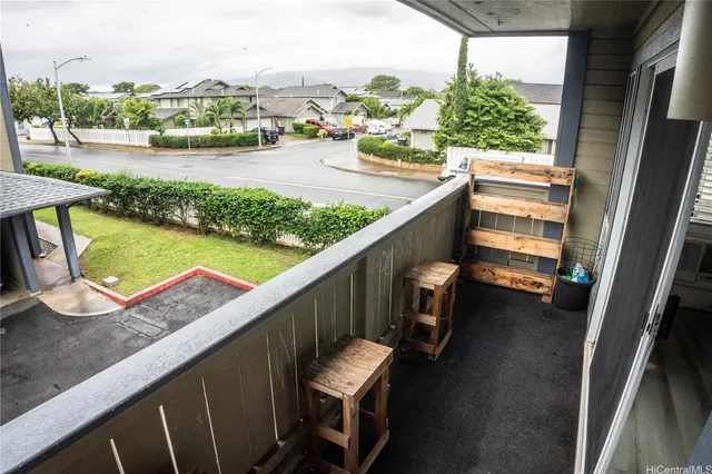 a view of swimming pool from a balcony