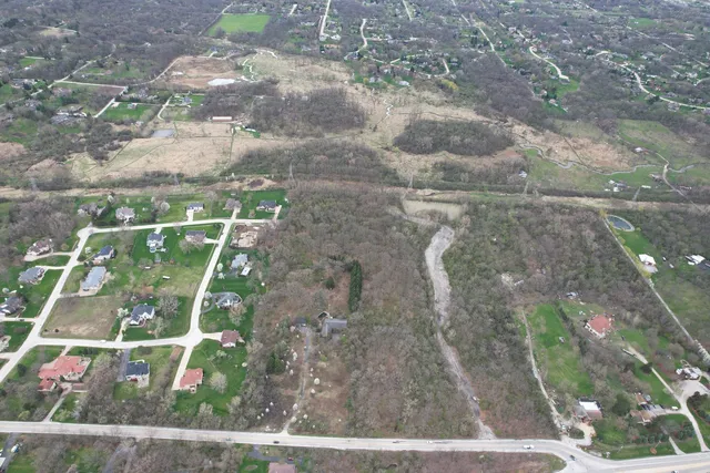 a view of a yard with a bench