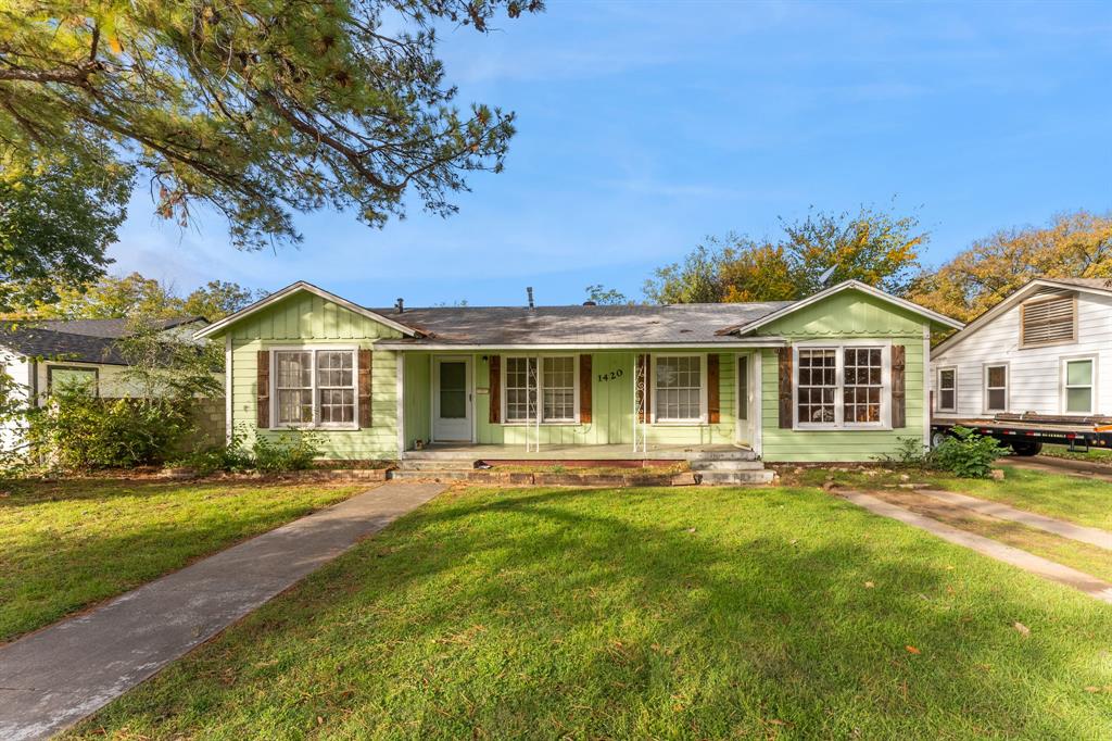 1420 Bennett Drive Arlington, TX 76013 - Photo 1 of 1 a front view of a house with a yard
