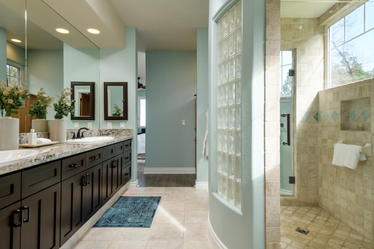 1511 Polipoli Road, Unit A & B Kula, HI 96790 - Photo 14 of 30 a bathroom with a double vanity sink and a mirror