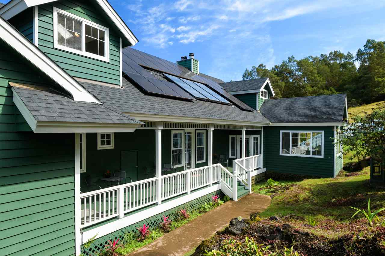 1511 Polipoli Road, Unit A & B Kula, HI 96790 - Photo 15 of 30 a front view of a house with a yard