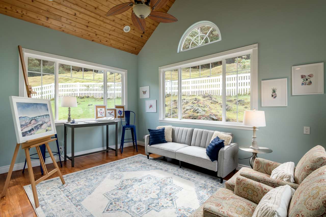 1511 Polipoli Road, Unit A & B Kula, HI 96790 - Photo 16 of 30 a living room with furniture and a large window