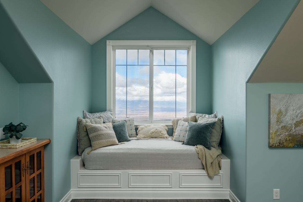 1511 Polipoli Road, Unit A & B Kula, HI 96790 - Photo 19 of 30 a bedroom with furniture and windows