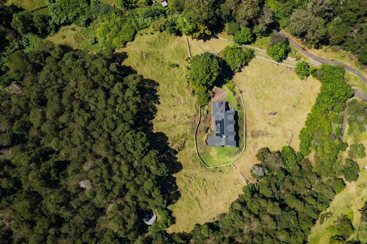 1511 Polipoli Road, Unit A & B Kula, HI 96790 - Photo 26 of 30 an aerial view of residential house with swimming pool