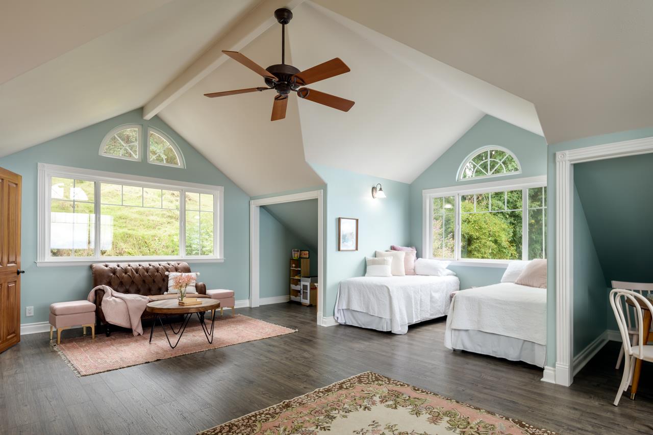 1511 Polipoli Road, Unit A & B Kula, HI 96790 - Photo 27 of 30 a living room with furniture and a flat screen tv