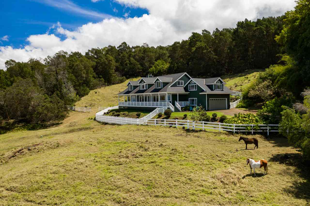 1511 Polipoli Road, Unit A & B Kula, HI 96790 - Photo 4 of 30 a view of a swimming pool with a garden