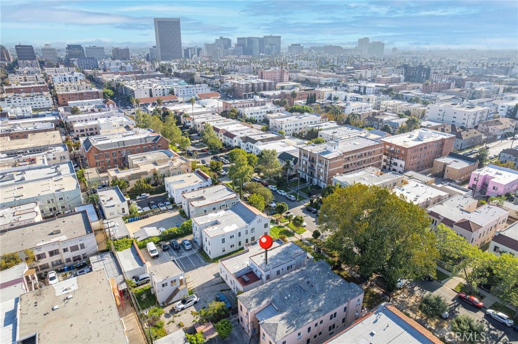 144 South Catalina Street Los Angeles, CA 90004 - Photo 1 of 7 an aerial view of a city with lots of residential buildings
