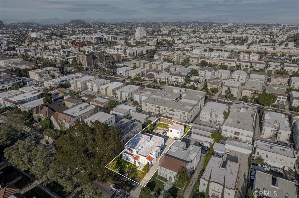 144 South Catalina Street Los Angeles, CA 90004 - Photo 5 of 7 an aerial view of a house with a yard