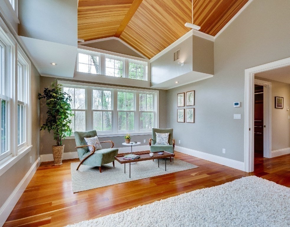 75 Todd Pond Road Lincoln, MA 01773 - Photo 21 of 39 a living room filled with furniture hardwood floor and a floor to ceiling window