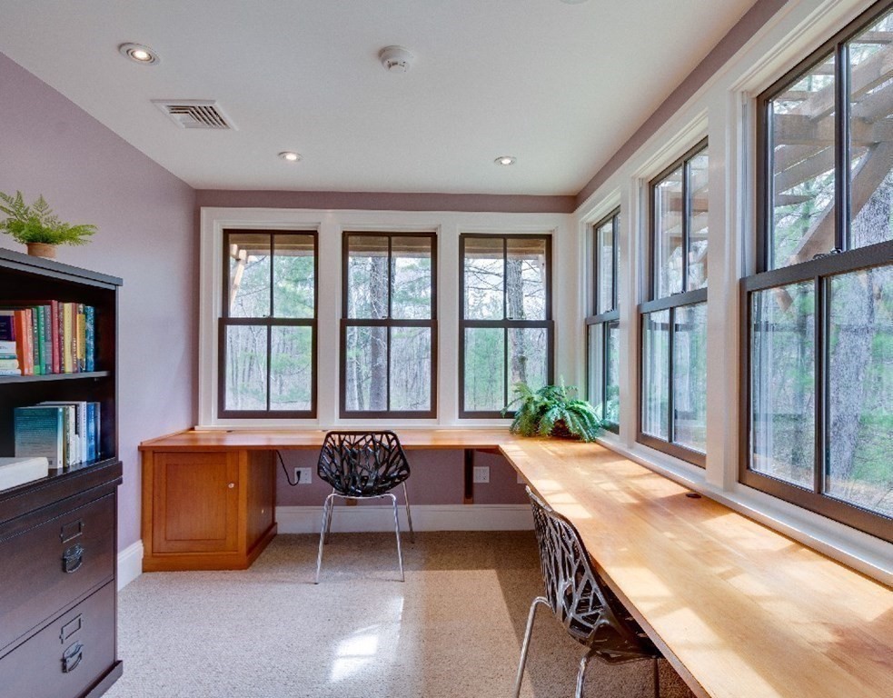 75 Todd Pond Road Lincoln, MA 01773 - Photo 24 of 39 a living room with furniture and a window