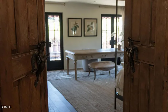 a view of a livingroom with furniture and window