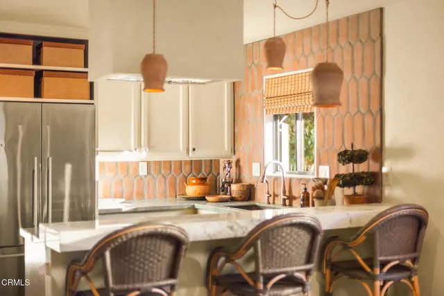 a kitchen with a sink and a window