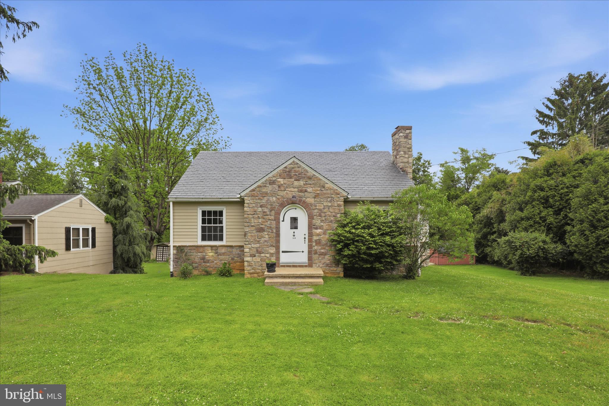 169 School House Road Lancaster, PA 17603 - Photo 1 of 39 a front view of a house with a garden