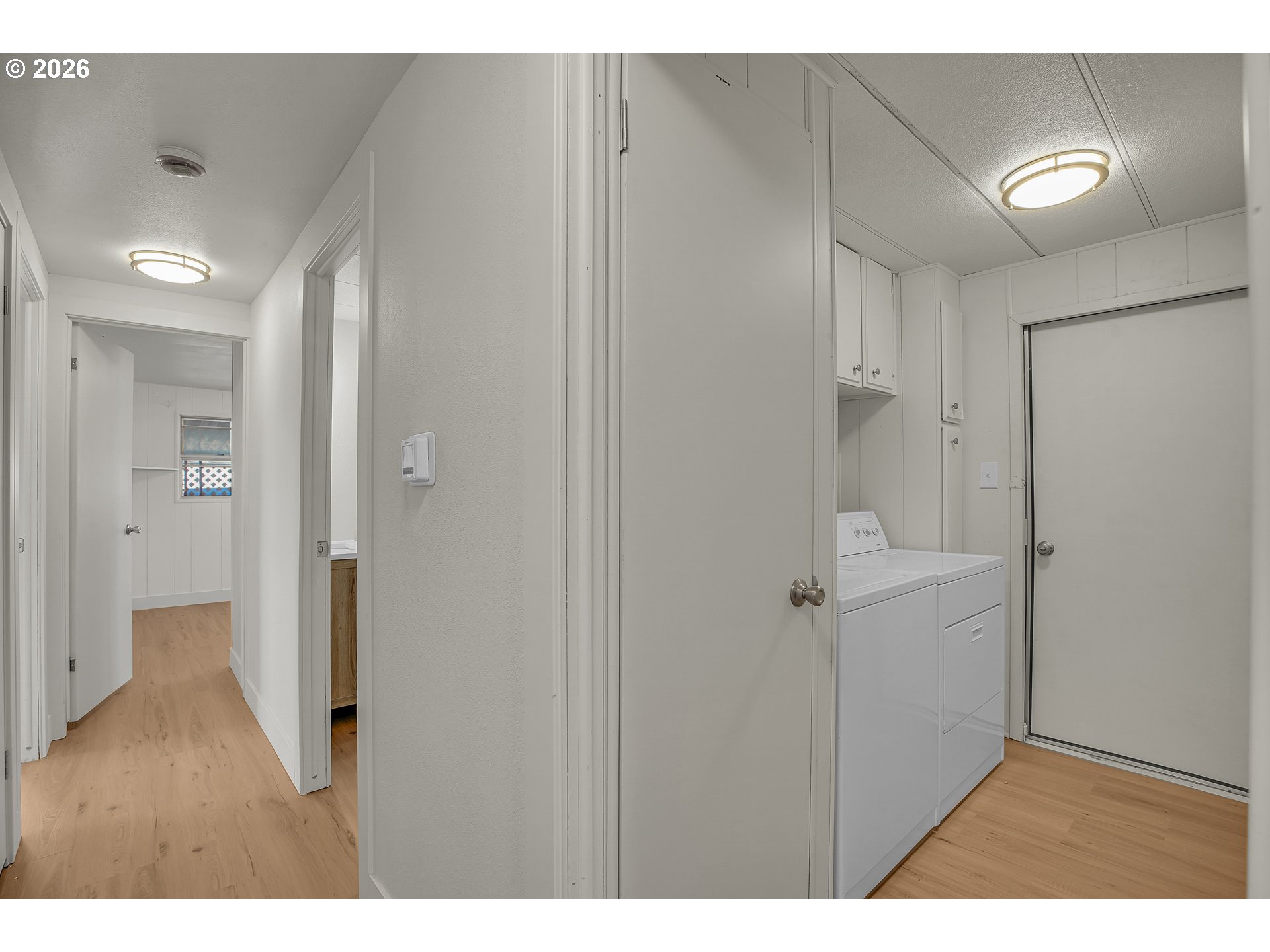 4400 Southeast Roethe Road, Unit 51 Milwaukie, OR 97267 - Photo 21 of 48 a view of a hallway with wooden floor