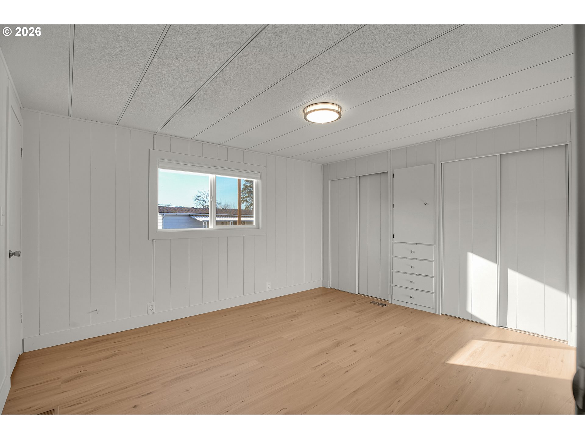 4400 Southeast Roethe Road, Unit 51 Milwaukie, OR 97267 - Photo 28 of 48 a view of an empty room with a window