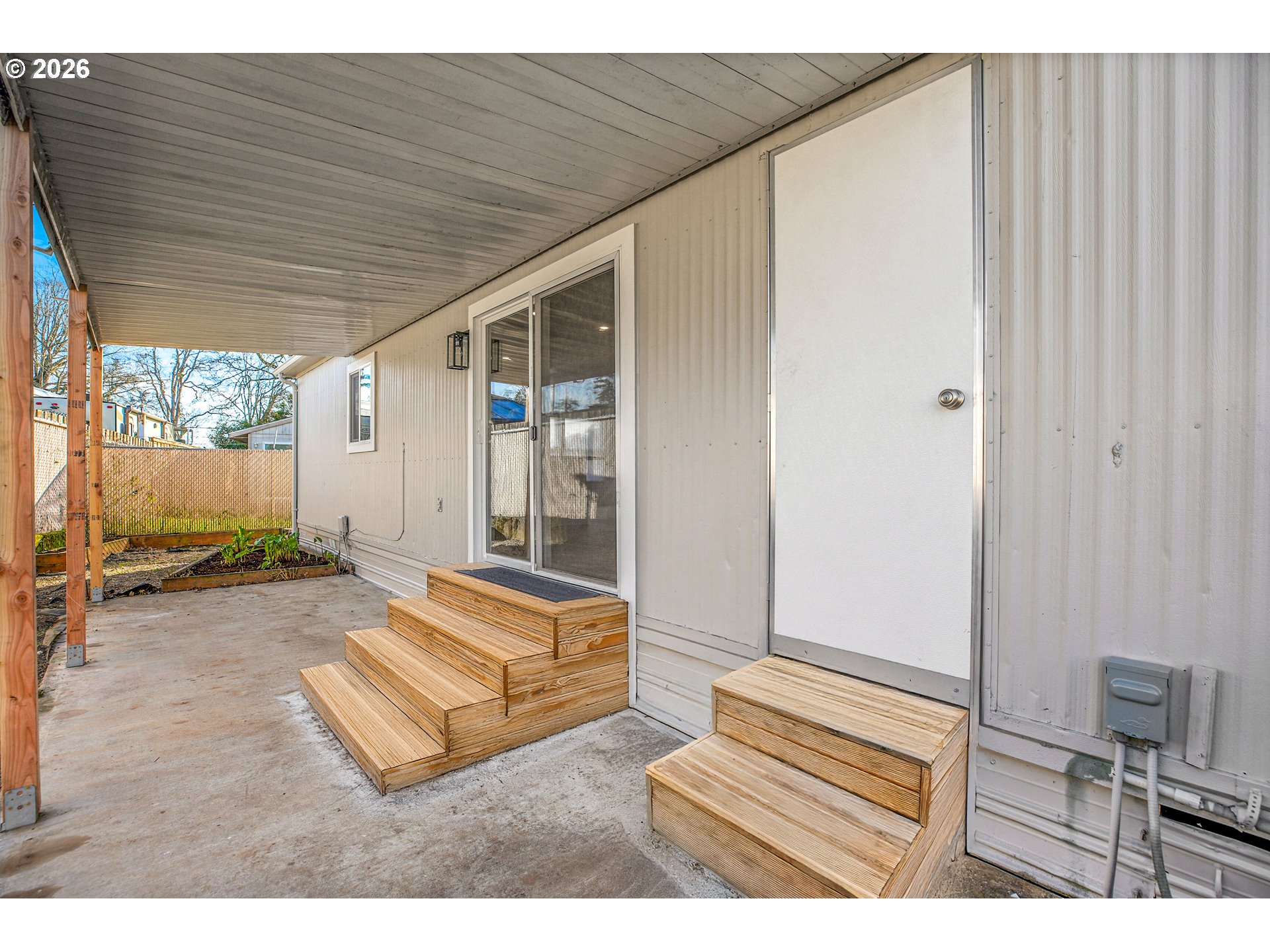 4400 Southeast Roethe Road, Unit 51 Milwaukie, OR 97267 - Photo 37 of 48 a spacious bedroom with a bed and a window
