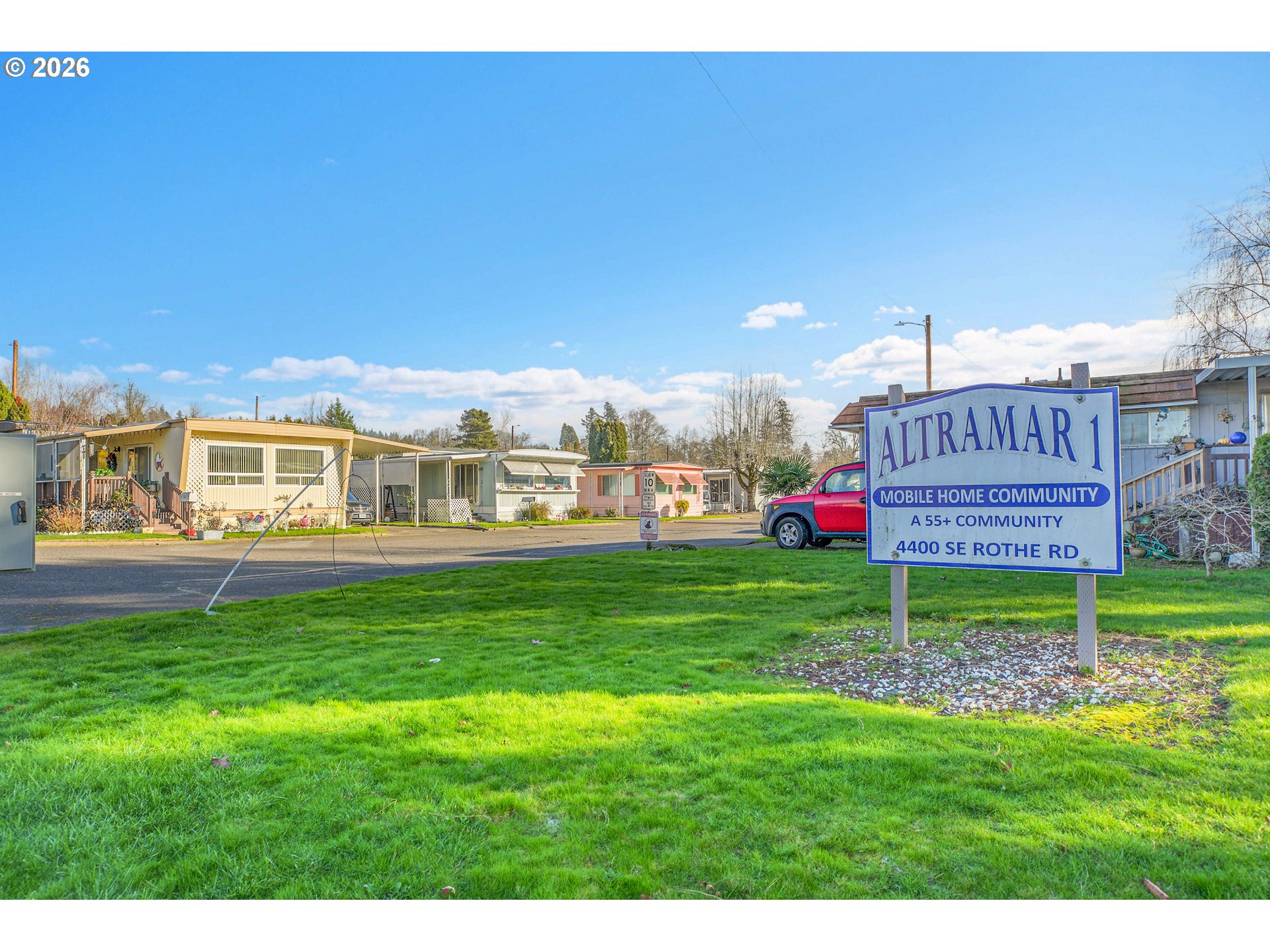 4400 Southeast Roethe Road, Unit 51 Milwaukie, OR 97267 - Photo 48 of 48 a view of a house with a yard table and chairs