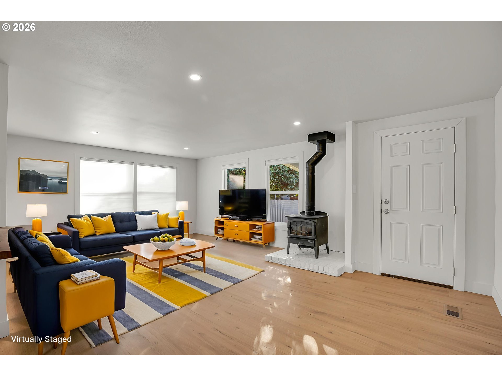 4400 Southeast Roethe Road, Unit 51 Milwaukie, OR 97267 - Photo 6 of 48 a living room with furniture and a fireplace