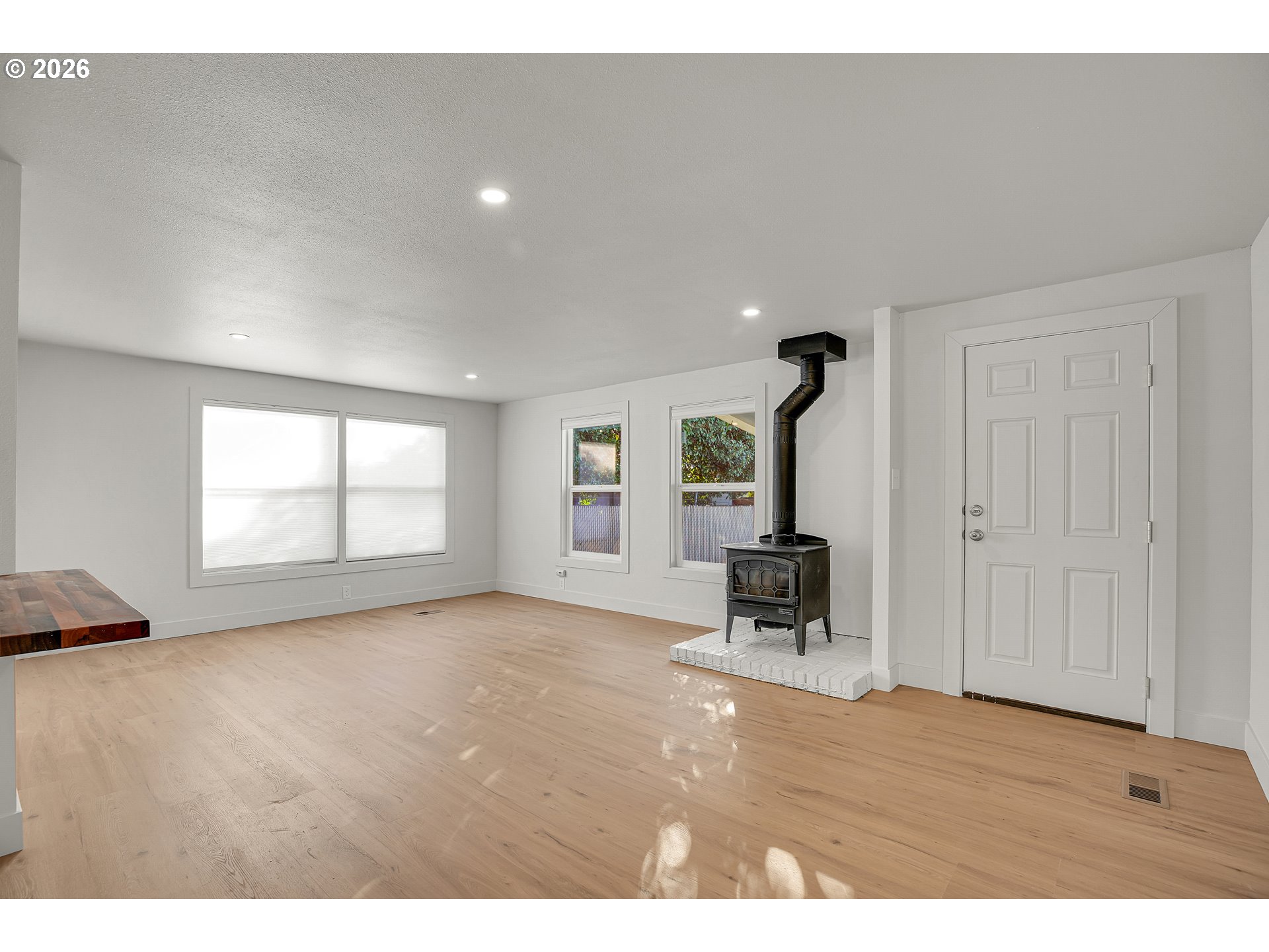 4400 Southeast Roethe Road, Unit 51 Milwaukie, OR 97267 - Photo 7 of 48 a living room with furniture and a window